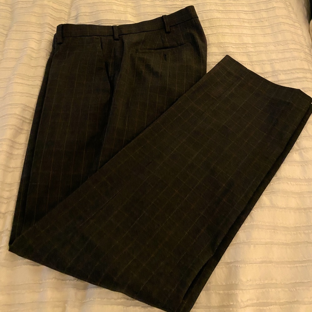 Brown pant with burnt orange/tan plaid pattern. Extra smooth